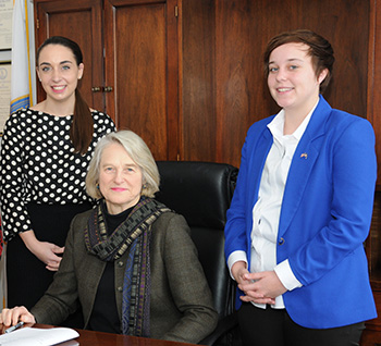 Betsy Carr '68 with Mercury Hipp '15, who was serving as an intern in January 2014. To the left of Carr is former intern Kelsey DeForest '13, who worked in Carr's office after graduation. 