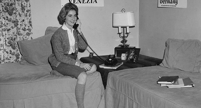 Student on her phone, 60s
