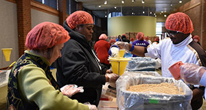Photo of staff filling boxes