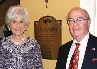 Elizabeth “Libby” Hall McDonnell ’62 and her husband, James, in the theatre’s lobby.