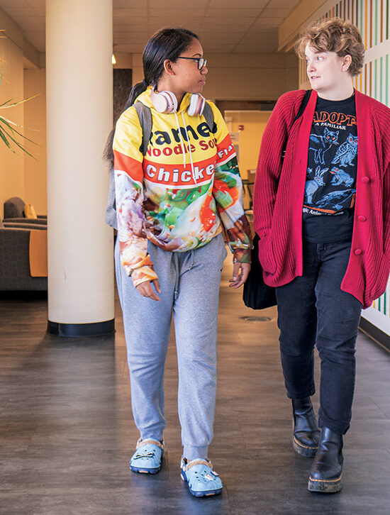 Two Hollins students walking in Dana Science Building