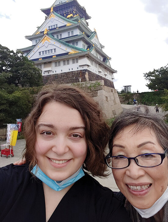 Madeline Evangelista and her host mother Yumi in front of Osaka Castle.