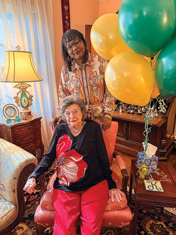 President Hinton visits "Winnie" Glover Boone Klein on her 108th birthday