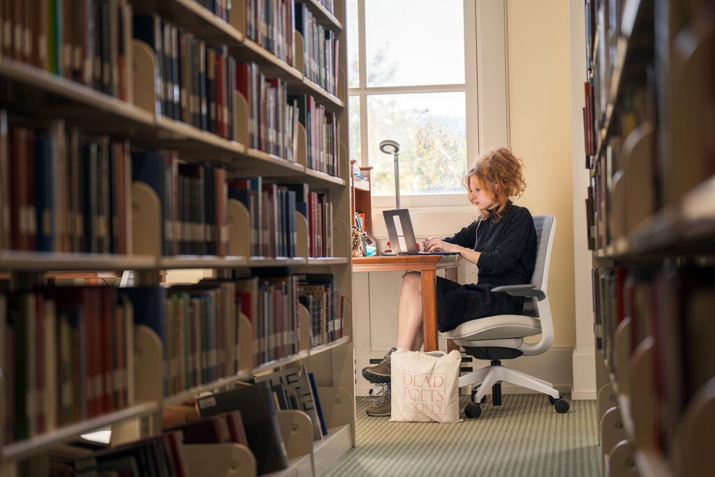 Student studying on 2nd floor - Library - Fall 2023